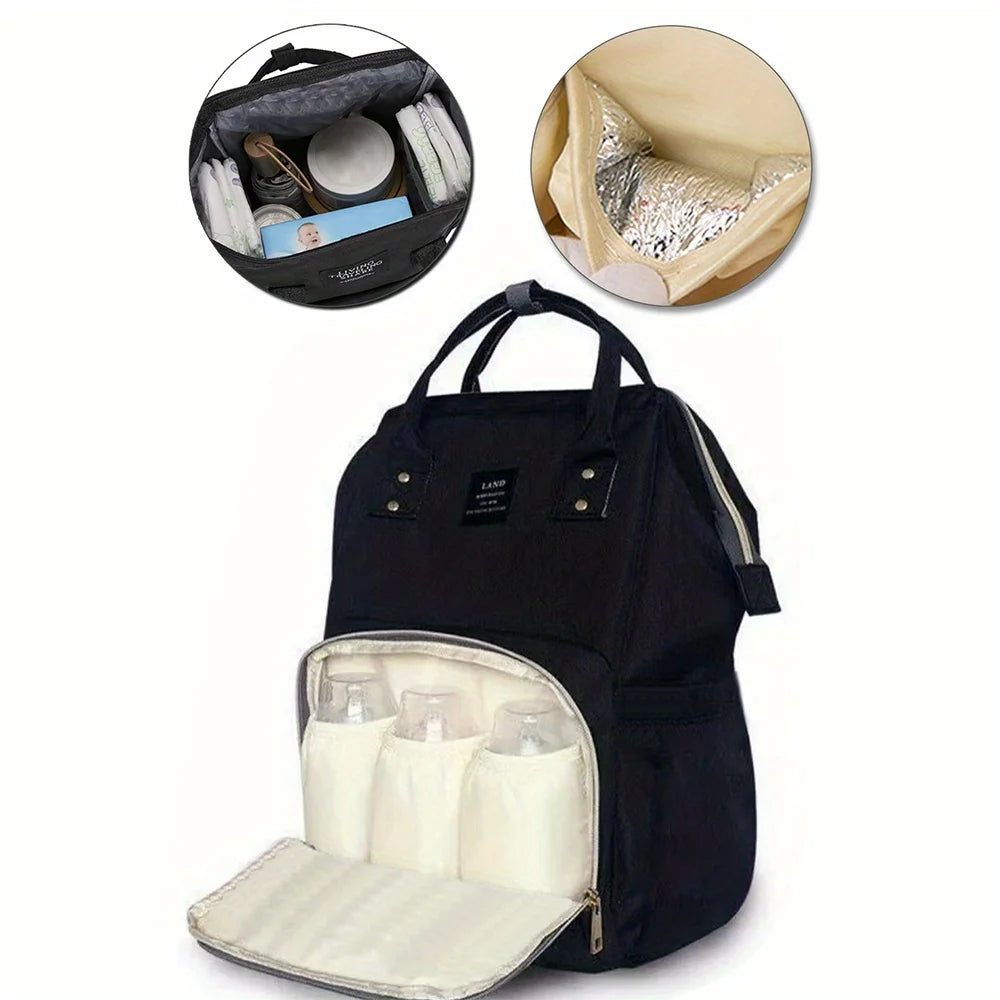 sac à langer noir au dos rangement