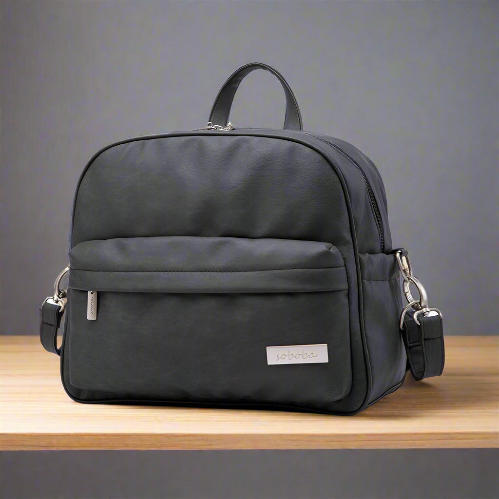 sac a dos a langer compacte noir avec sangles