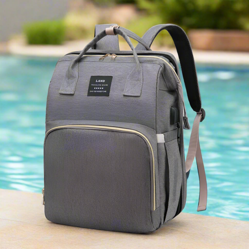 sac à dos à langer pliable gris