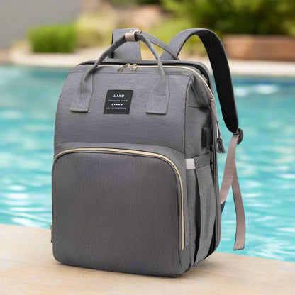 sac à dos à langer pliable gris